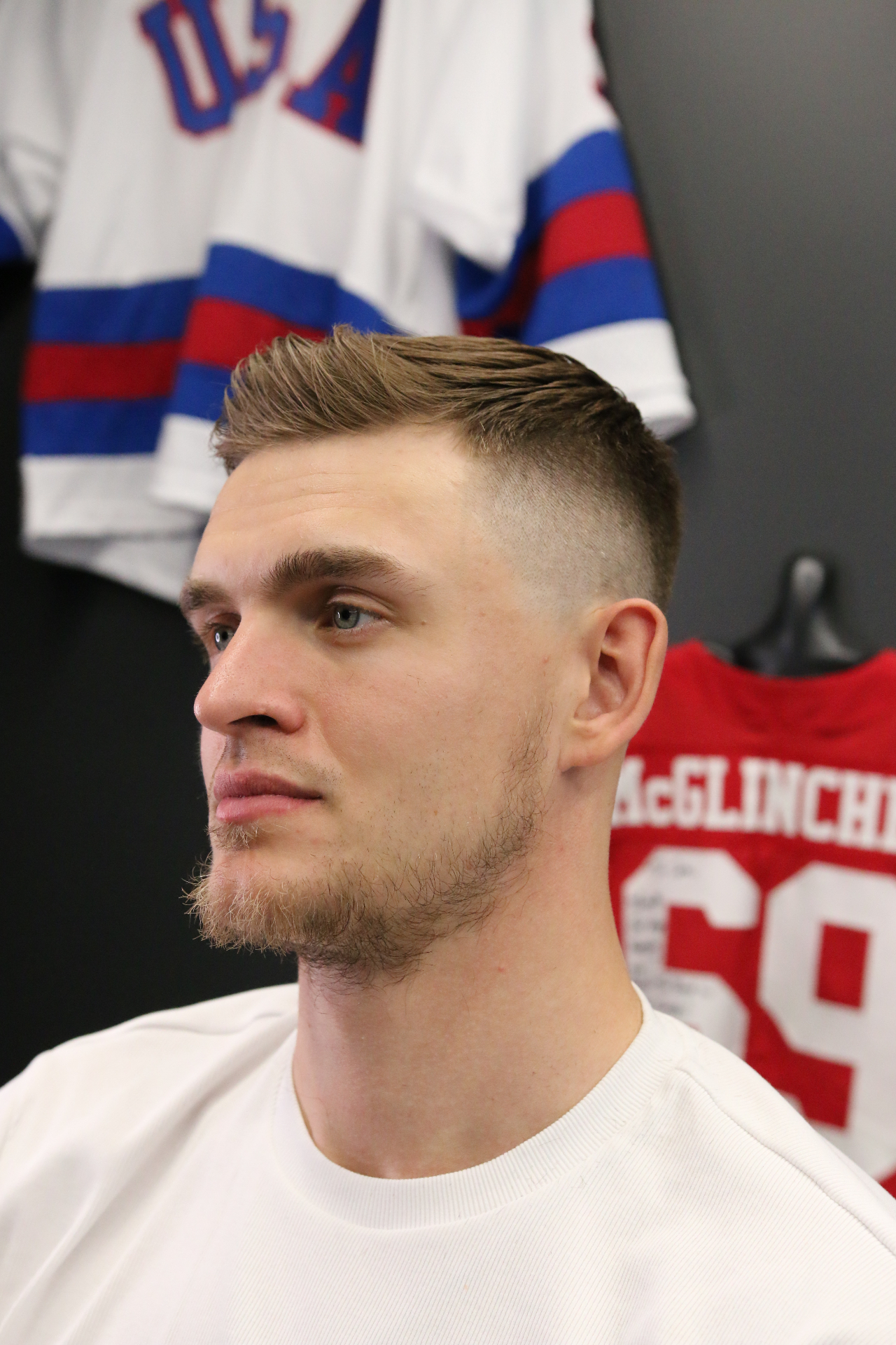Classic side-part with high skin fade